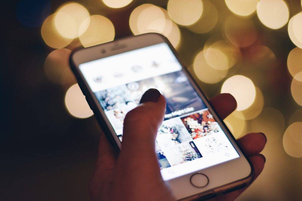 Social Commerce: mobile-phone-with-instagram-social-media-images-on-2021-08-30-14-50-23-utc-1024x683