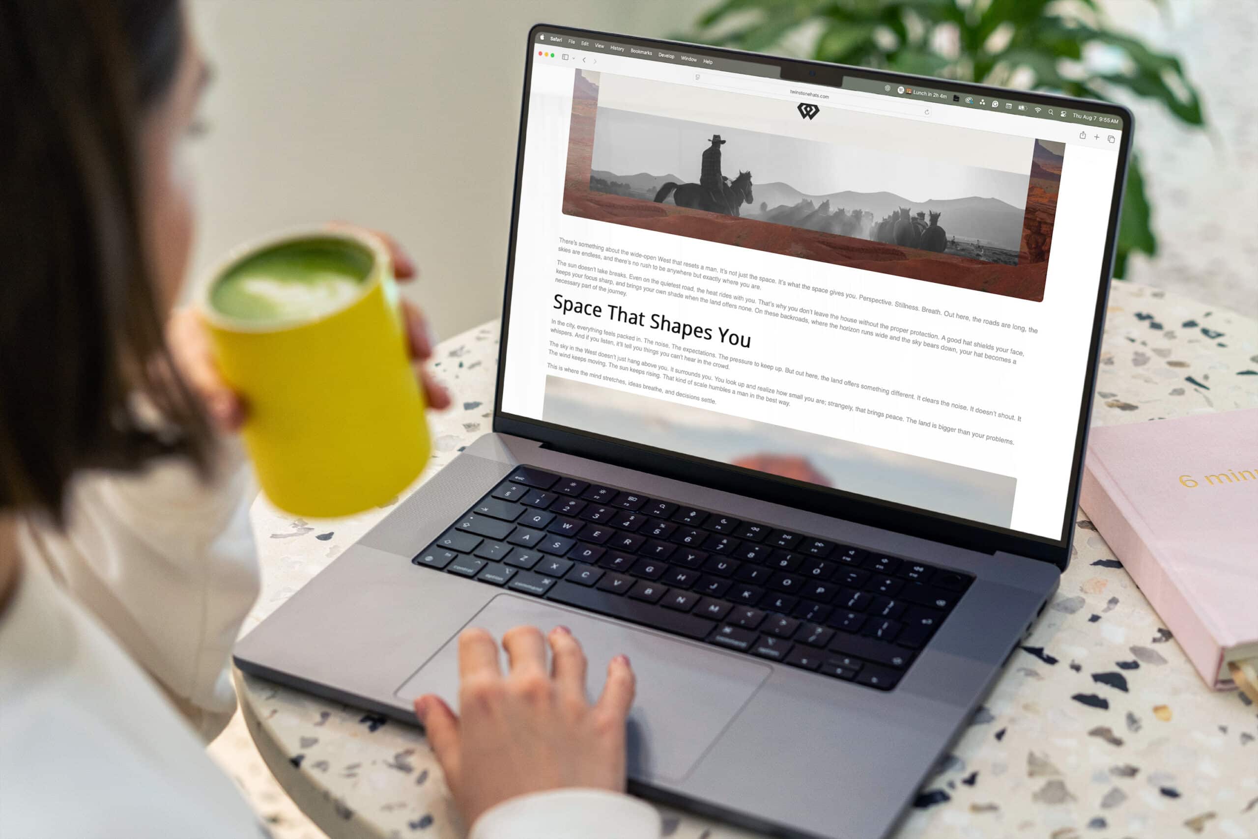 Lifestyle Website Preview - AI-Powered SEO Services » Advent Trinity Marketing Agency Woman browsing cowboy lifestyle blog on MacBook with matcha
