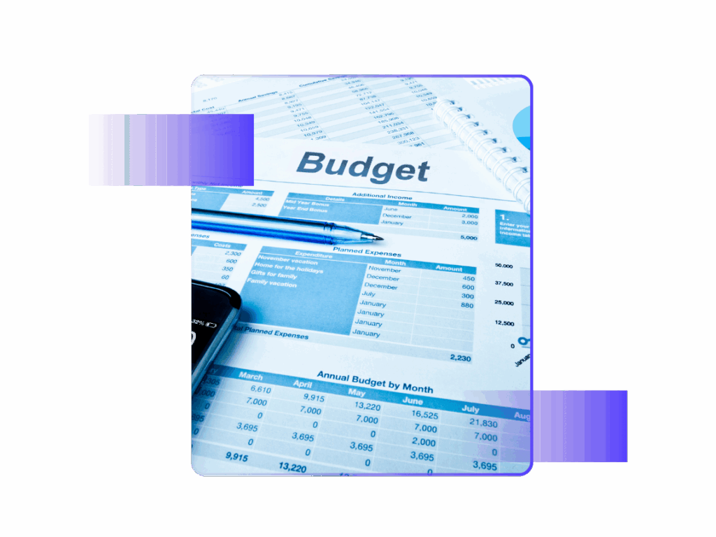 Close-up of a printed budget sheet with financial figures, blue pen, and smartphone on a desk.